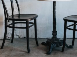 The 90% divorce prediction that was never a prediction Two chairs and a small table against a white wall