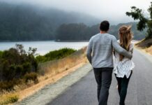 Opposites don’t attract, but that was never the interesting question A man and woman walking together along a road