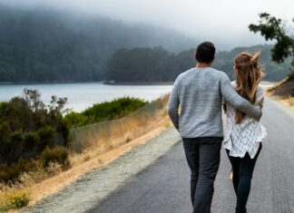 Opposites don’t attract, but that was never the interesting question A man and woman walking together along a road