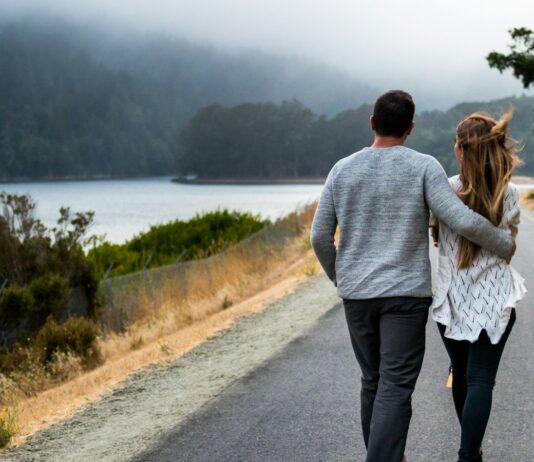 Opposites don’t attract, but that was never the interesting question A man and woman walking together along a road