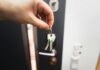 Renting is not throwing money away, but the real argument is stranger A person holding a key to a door