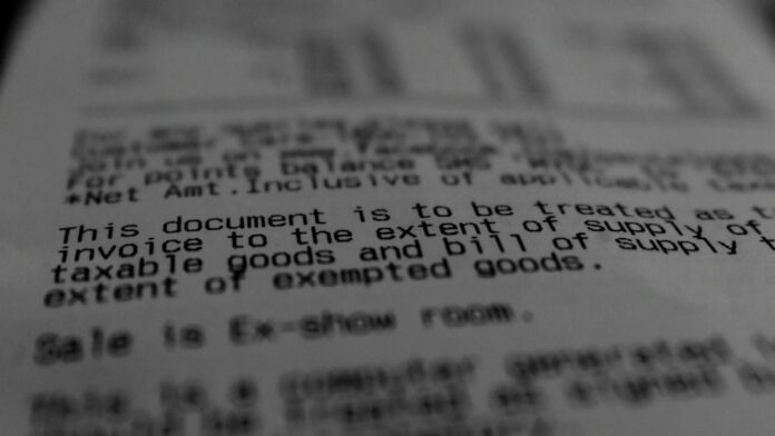 A close-up of printed text on a shop receipt