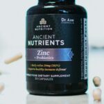 The Vitamin D Trials Nobody Talks About A bottle of vitamin supplements on a plain surface