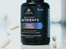 The Vitamin D Trials Nobody Talks About A bottle of vitamin supplements on a plain surface