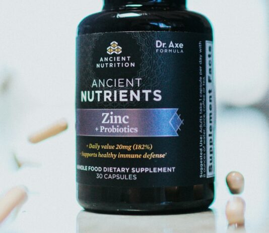 The Vitamin D Trials Nobody Talks About A bottle of vitamin supplements on a plain surface