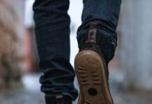 No health authority has ever recommended 10,000 steps Close-up of a person walking on a pavement