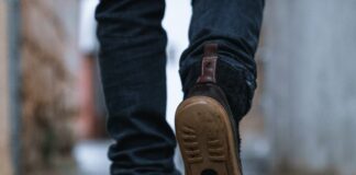 No health authority has ever recommended 10,000 steps Close-up of a person walking on a pavement