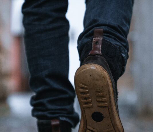 No health authority has ever recommended 10,000 steps Close-up of a person walking on a pavement